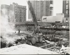 Equipment in use at the construction site for the Boston Public Library Johnson building, December 1969