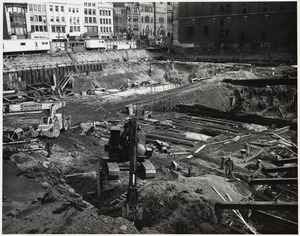 Equipment in use during excavation of the construction site for the Boston Public Library Johnson building, March 1970