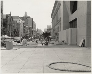 Constructions workers on site outside Boston Public Library Johnson building during construction, May 1972