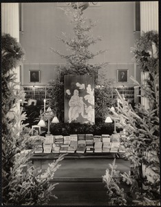 West End Branch. Christmas decorations and exhibit 1933. The wood carved Madonna is a detail from DaVinci's "Adoration of the Magi," by Boris Mirski. 19 Irving St. Boston, Mass.