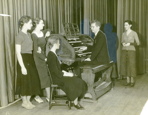 Girls listening to organist (Abbot Academy)