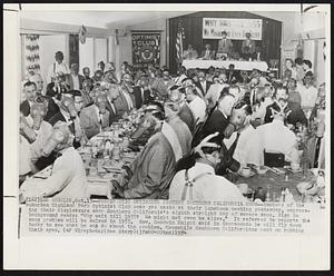 Pessimistic Optimists Protest Southern California Smog--Members of the suburban Highland Park Optimist Club wear gas masks at their luncheon meeting yesterday, expressing their displeasure over Southern California’s eight straight day of severe smog. Sign in background reads: “Why wait till 1955? We might not even be alive.” It referred to reports the smog problem will be solved in 1955. Gov. Goodwin Knight said in Sacramento he will fly down today to see what he can do about the problem. Meanwhile Southern Californians went on rubbing their eyes.