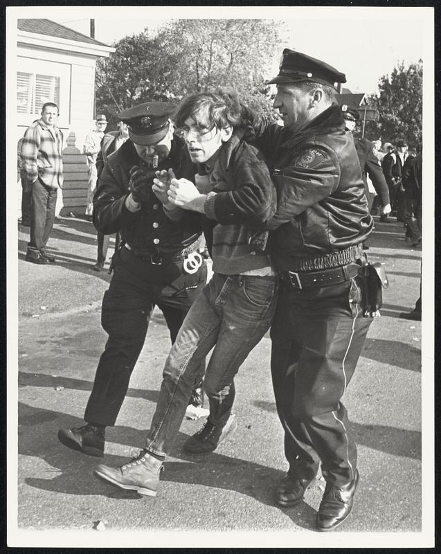 Picket hustled out of Picket line at St entrance of GE in Lynn