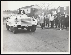 Fort Devens. Legionnaire offers tank of gas, to Anti-Johnson police people.