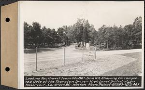 Contract No. 80, High Level Distribution Reservoir, Weston, looking southwest from Sta. 80+/-, dam 4, showing uncompleted gate at the Thornton Drive, high level distribution reservoir, Weston, Mass., Aug. 12, 1940