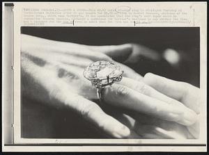 Quite a Stone--This 69.42 carat diamond ring is displayed Thursday at Parke-Bernet Galleries after it was bought for $1.05 million by Robert Kenmore, chairman of the Kenton Corp., which owns Cartier's. It was speculated that the ring's next buyer would be Jacqueline Kennedy Onassis, although a spokesman for Cartier's declined to say whether the firm had a customer for the gem or even to admit that the firm had bought it.