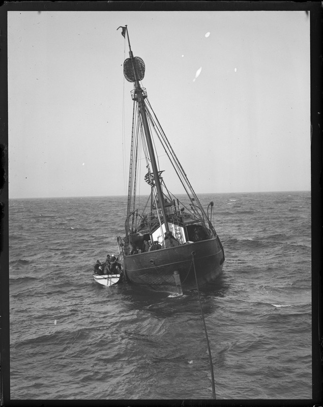 Rescued party leaving lightship to be taken aboard cutter. USLHS. Vineyard.