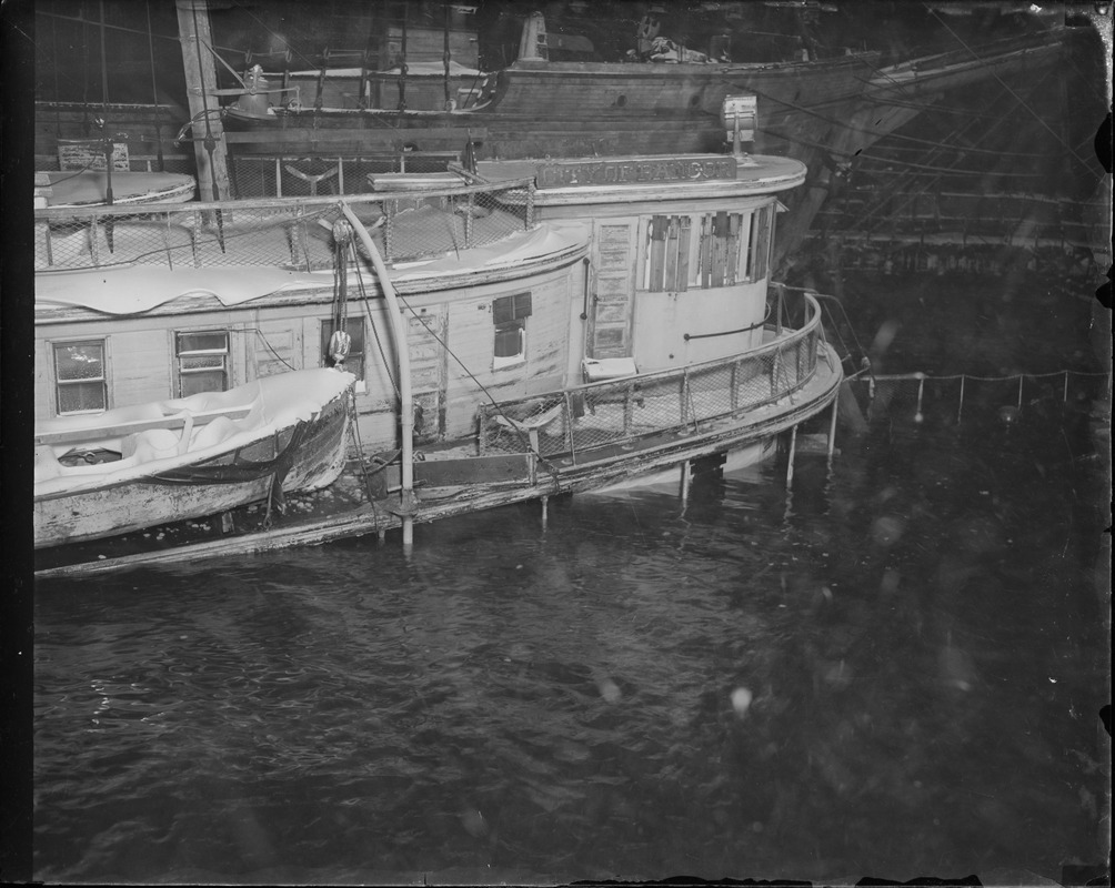 Sunken Boat at dock, city of Bangor