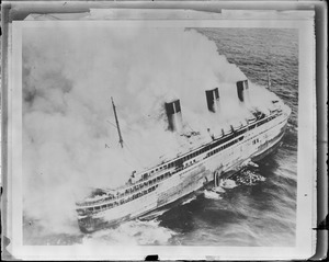 Liner SS Atlantique on fire off Guernsey Great Britain. The French liner was destroyed. Damages $18,000,000.