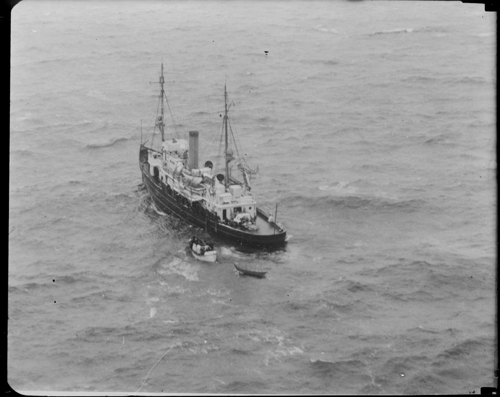 USCG ship Redwing taking care of passengers on SS Robert E. Lee high on Mary Ann Ledge