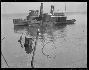 Tug sinks at old T-wharf