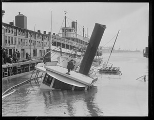 Steamer Catherine sinks at old T-wharf