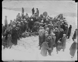 Working on one of the Manomet life saving crew after he fell into icy water during SS Robert E. Lee rescue. The man died.