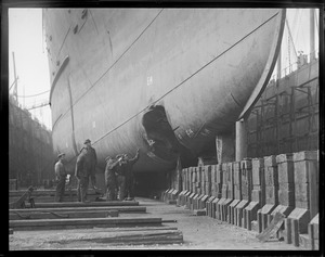 Hull of SS Robert E. Lee in East Boston drydock showing damage from hitting Mary Ann rocks off Manomet two months before