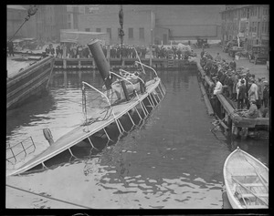 Crowd eyeing the steamer Catherine which sank at T-wharf
