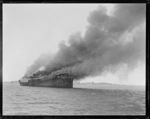 SS Coyote burns off Apple Island, for junk