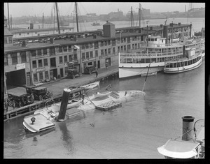 Steamer Catherine sinks at T-Wharf, SS King Phillip astern of her