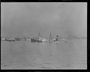 Distant view of the steamer Peirce sunk in Harbor after collision