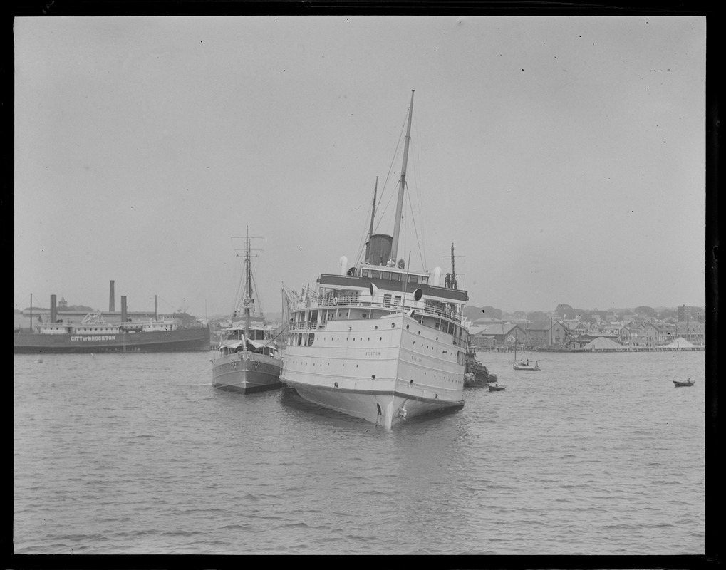 Steamer Boston listing, helped by tugboats Digital Commonwealth