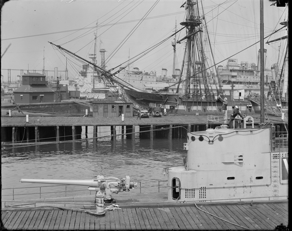 Sub V-3 docked next to sailing ship in Navy Yard