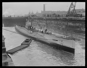 Sub S-4 flooded to be floated and towed to pier 7