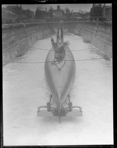 Drydock filling with water to float the S-4 that has been inflated and repaired