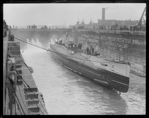 Water pouring into dry dock to float the S-4 after she had been repaired