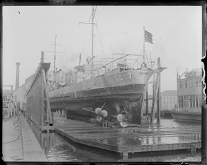USS Paulding on marine railway at Navy Yard with torn bow after she sank sub S-4