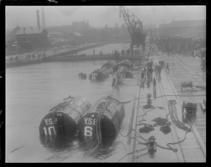 Sub S-4 tied up at pier at Navy Yard just before entering drydock