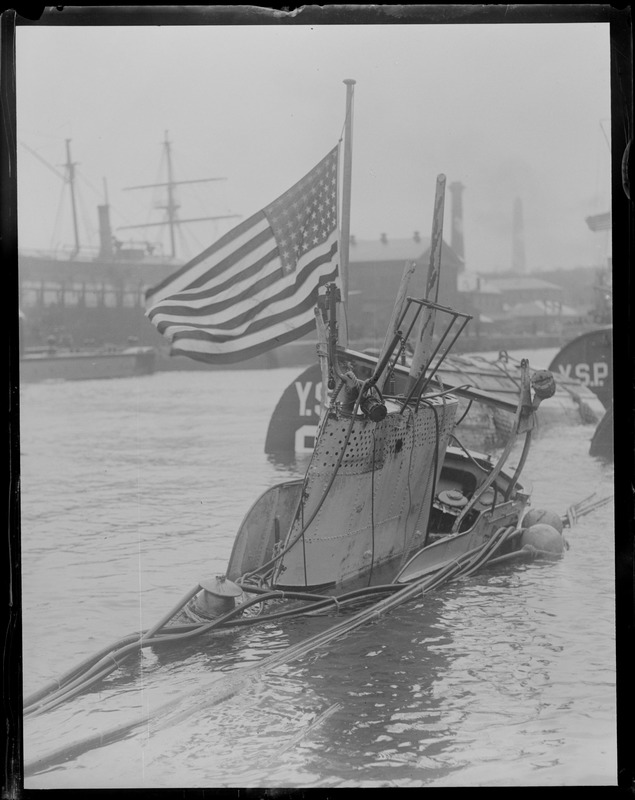 Old Glory at half mast on Conning Tower of the sub S-4 at Navy Yard