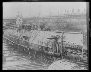 Sub S-4 in dry dock at Navy Yard showing hole made by the USS Paulding
