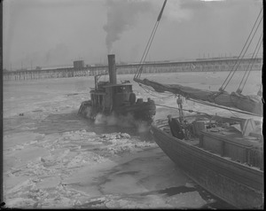 Tug Joseph W. Ross and schooner in ice at fish pier