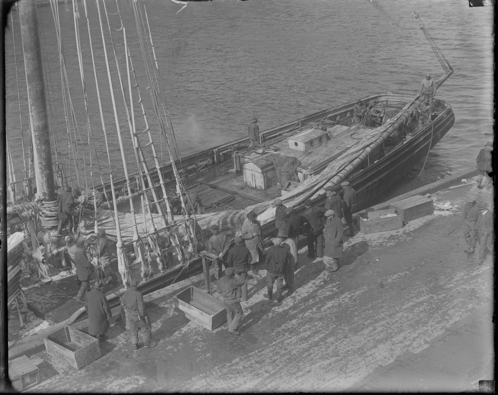 Fishing schooner Mayflower in port, with her main boom splintered