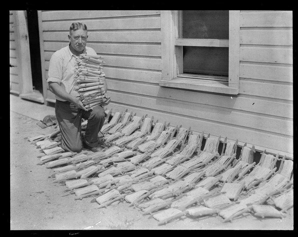 Fisherman with spools of fishing line