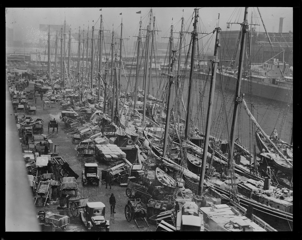 Trawlers sheltering at fish pier during Northeast snowstorm