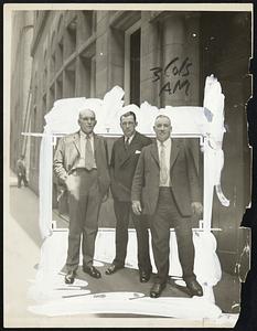 Left to right-James J. Jeffries, former heavyweight champion of the world. Jack Sharkey, New England heavyweight champion, who meets Gorman at Braves field tomorrow night, and Tom Sharkey, title contender when Jeffries was king. Jeffries and Tom Sharkey are in vaudeville together here this week and posed for this photo with the New England champion outside of the Adams house.