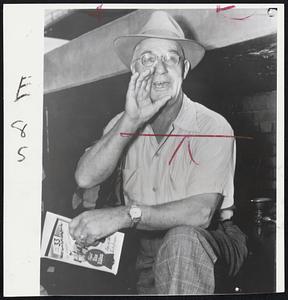 Booting his Dodgers Home is manager Burt Shotton of the league-leading Brooklyn club. But Burt's boys dropped a 4-3 decision to the Cubs yesterday when Cliff Aberson poled a grand-slam homer. "It's one of baseball's hidden banana skins," mused Burt.