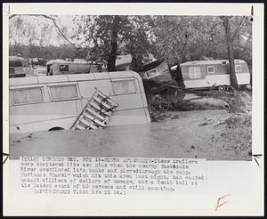 Storm Aftermath-These trailers were scattered like ten pins when the nearby Etobocoke River overflowed it's banks and plowed through the camp. Hurricane "Hazel" which hit this area last night, has caused untold millions of dollars of damage, and a death toll at the latest count of 60 persons and still mounting.