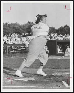 Babe Ruth of Canton-Mrs. May Cooke swats the first of four homeruns for the winning Snobs in the Canton Little League annual mothers’ game at Dedham Field yesterday. The Snobs beat the Hobos 11-7. Selectmen of the town were umpires.