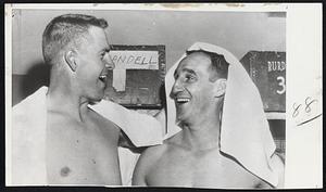Winning Combination for the Milwaukee club is veteran southpaw Warren Spahn, right, and his battery made, Catcher Del Crandall. Spahn defeated the Giants in New York last night, 7-3, for his third straight victory enabling the Tribe to hold slim National League lead.