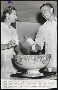 Tennis Finalists-Bobby Riggs (left) pours orange juice for Ted Schroeder here today after their victories which advance them to the finals tomorrow in the 54th annual invitation tennis tournament.
