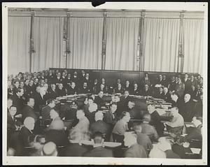 League of Nations Convenes -- A General View of the Meeting in Geneva, Recently of the League of Nations Delegates, When the Austro-German Customs Question Was Discussed. Among Those Who May be Seen in the Above Photo, Left to Right, Are: Johann Schober, Germany; Dr. Voja Marinkowitch, Jugoslavia; August Zaleski, Poland; Hymans, Belgium; Dino Grandi, Italy; Aristide Briand, France; Julius Curtius, Germany; Sir Eric Drummond, and Arthur Henderson, England; Ken Kichi Yoshizawa, Japan; Don Alejandro Lerroux, Spain, and Dr. Edwin Benes, Czecho-Slovakia.