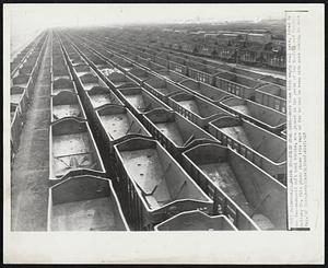 Idled Coal Cars--More than 6600 empty coal cars, idled by the two-week-old soft coal strike, are jammed in the yards of the Norfolk and Western Railway Co. This photo shown idle cars as far as can be seen with more coming in each day.