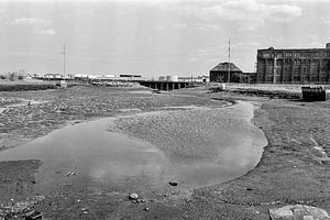 Chelsea Creek low tide, Forbes Industrial, railroad bridge and oil tanks