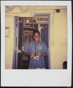 Young man holding a camera