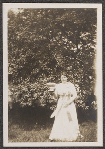 Portrait of a woman in a yard