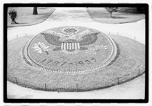 "1787-1937" floral design of the Great Seal of the United States in front of Ether Monument, Public Garden