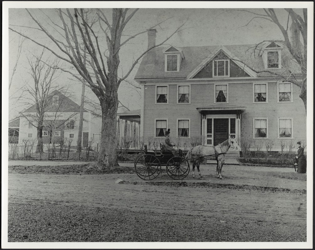 Ashdale Farm. Copy of early photo of Gertrude Stevens in horse and buggy in front of main house; barn on left; woman standing near tree on far right.