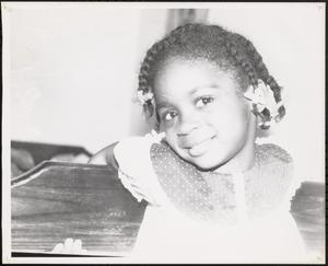 Smiling girl with braids