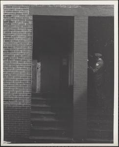 Letter carrier delivering mail, Johnny Ct., Chinatown, Boston